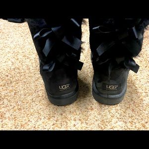 Black Ugg’s with Bows on the Back.